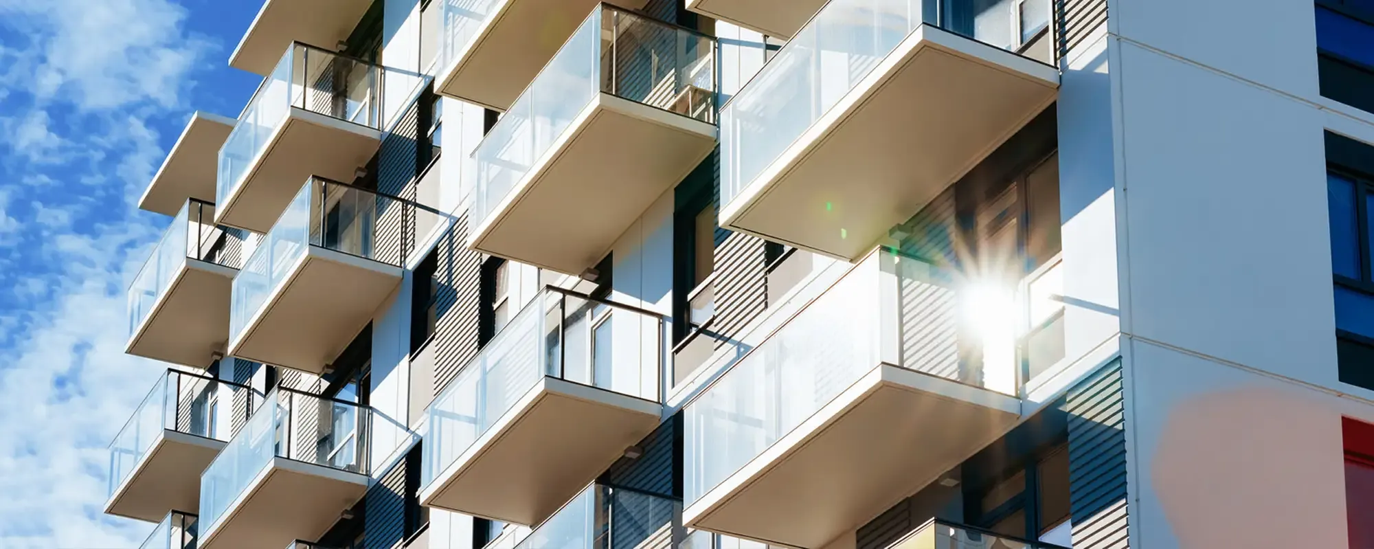 Residential building with sun reflection on the windows